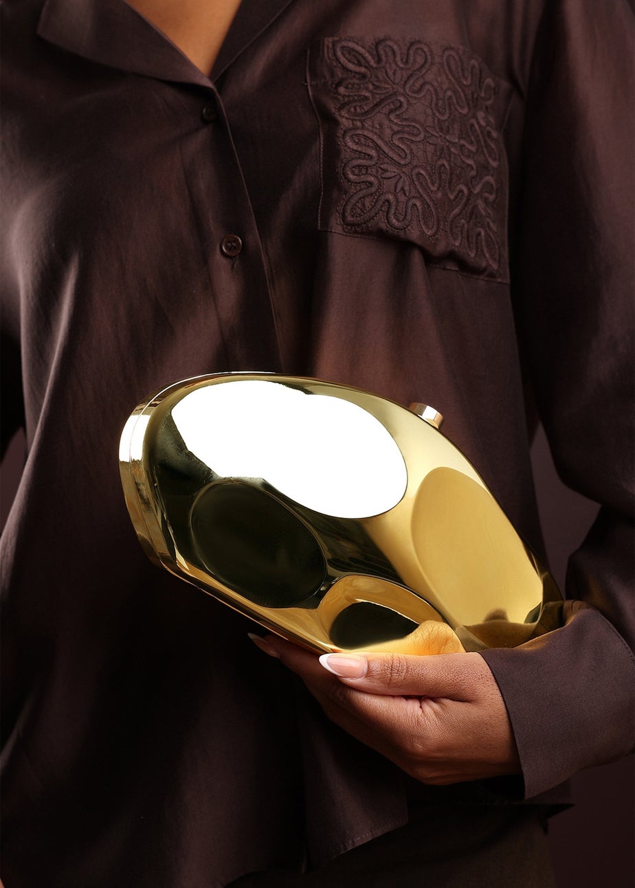 Where’s That From Nude Gold Sculpted Evening Clutch Bag