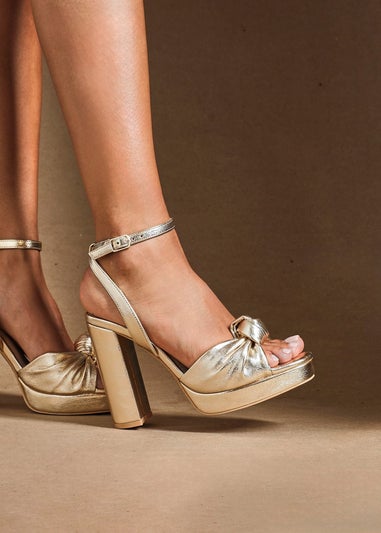 Linzi Ruba Gold Faux Leather Platform Heel