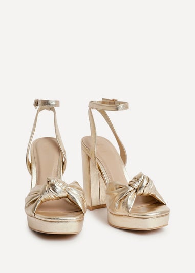 Linzi Ruba Gold Faux Leather Platform Heel