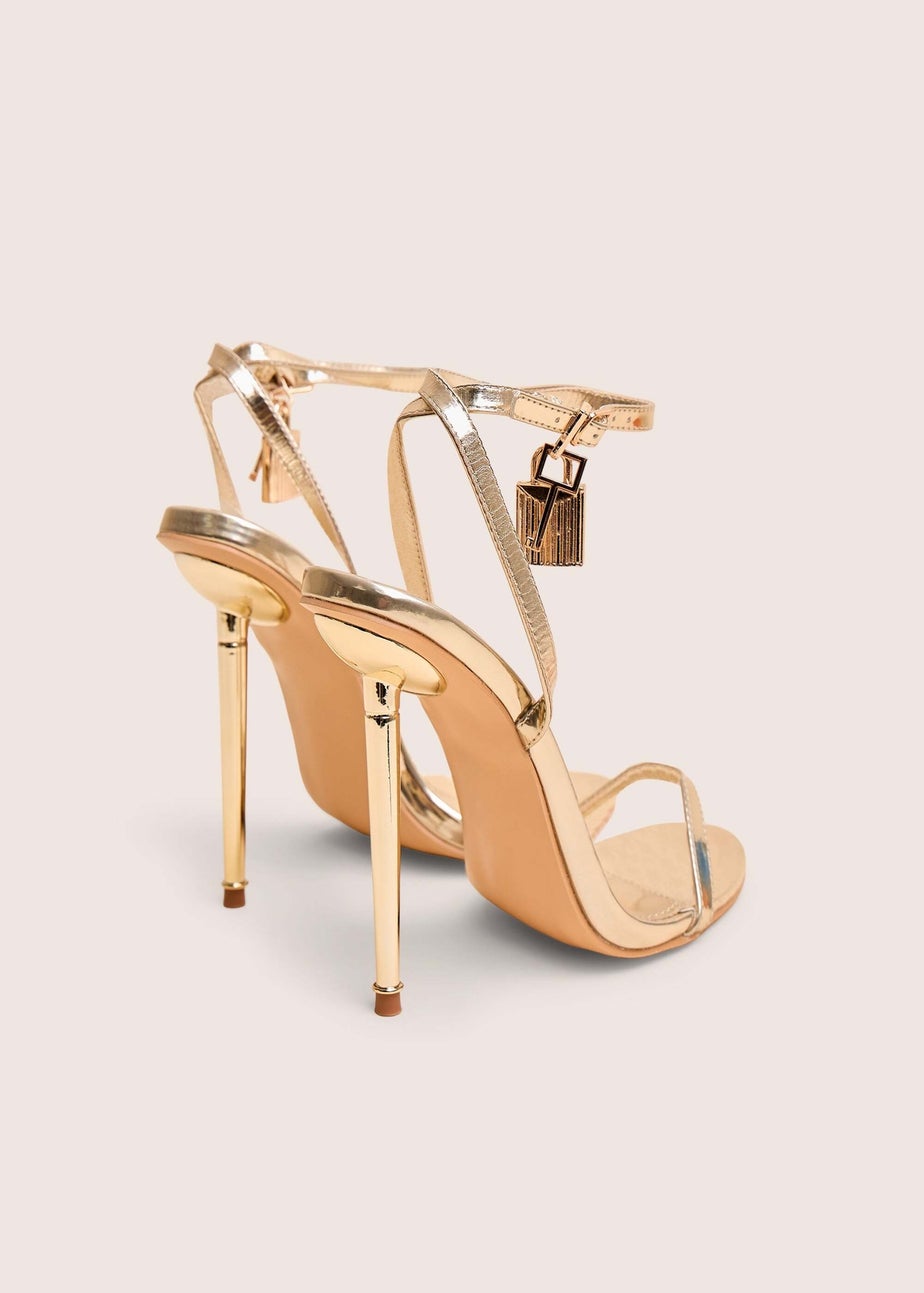 Public Desire Ti Amo Gold Wide Fit Metallic PU Padlock Detail Barely There Pointed Toe Stilettos Heels