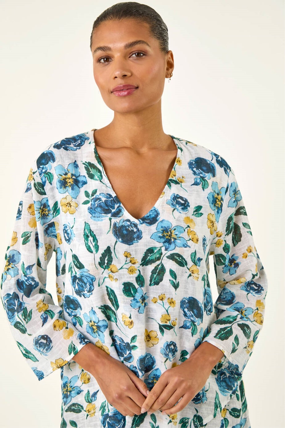 Roman Blue Floral Wrap Hem Tunic Top