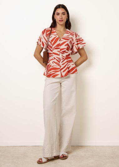 Blue Vanilla Orange Top With Brushstroke Leaf Print