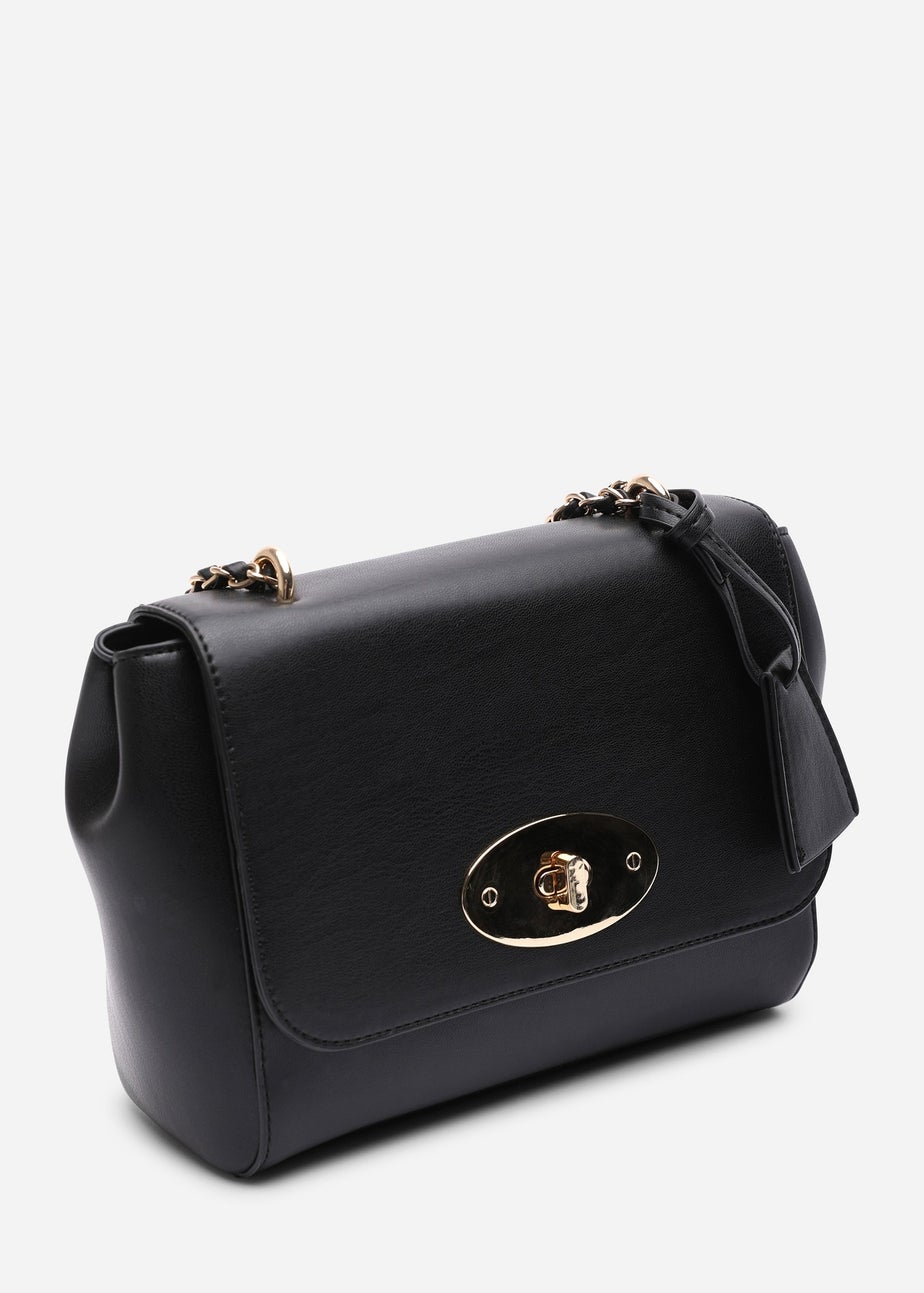 Where's That From Womens Noir Cross Body Chain Strap with lock fasten Bag In Black