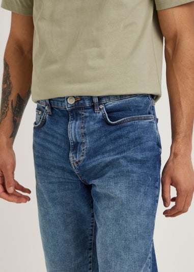 Mid Wash Slim Fit Tapered Jeans