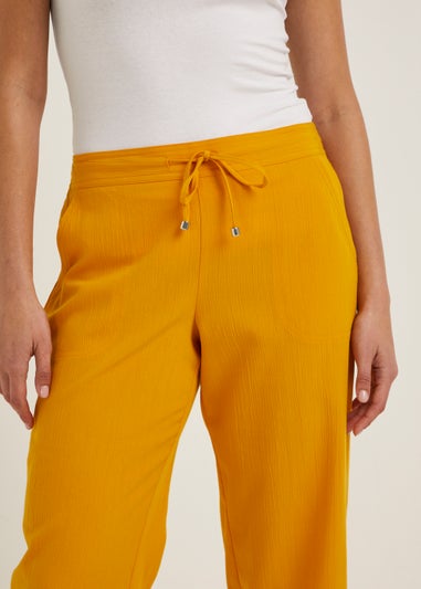 Orange Cropped Trousers