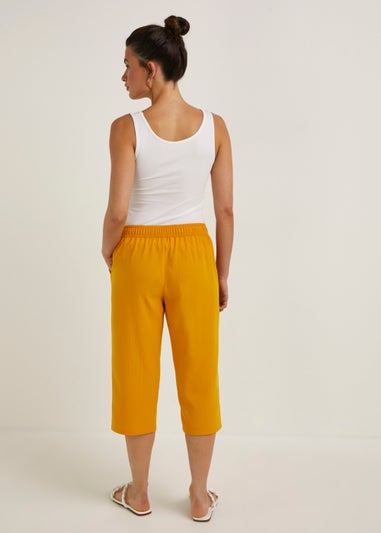 Orange Cropped Trousers