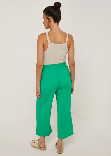 Green Textured Cropped Trousers