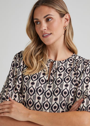 Cream Icon Print Mini Dress