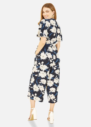 Mela Floral Print Jumpsuit With Angel Sleeves In Navy