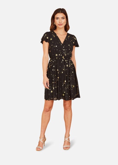 Mela Foil Star Print Wrap Skater Dress In Black