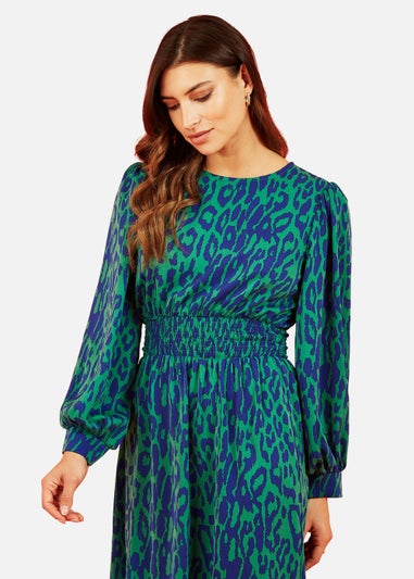 Mela Animal Print Long Sleeve Ruched Midi Dress In Green