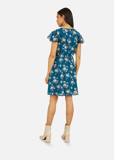 Mela Floral Print Wrap Over Skater Dress In Teal