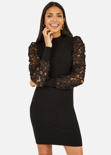 Mela Fitted Knitted Dress With Mesh Sleeve In Black