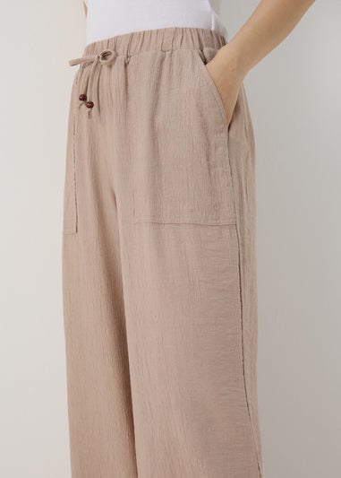 Beige Textured Wide Leg Trousers