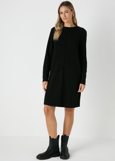 Black dress with sweater over it best sale