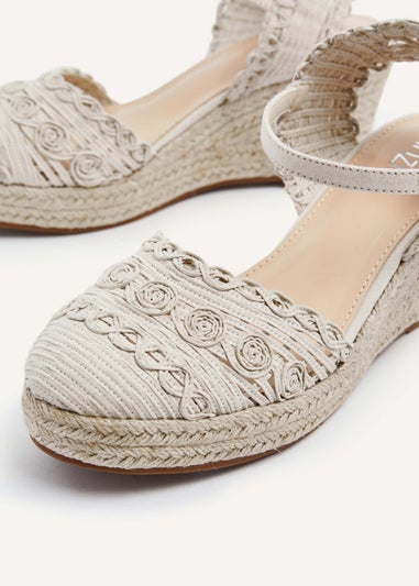 Linzi Riviera Beige Woven Closed Toe Espadrille Wedge