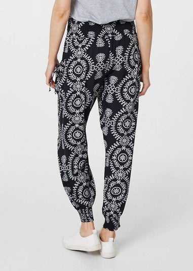 Izabel London Black Printed Smocked Waist Harem Pants