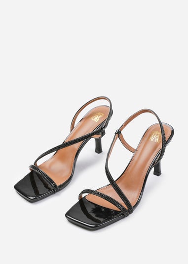 Where's That From Iowa Black Patent Cross Foot Strap Heels