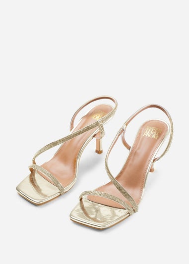 Where's That From Iowa Gold Metallic Cross Foot Strap Heels