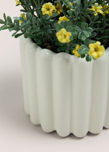 Yellow Ditsy Flowers In Ribbed Pot