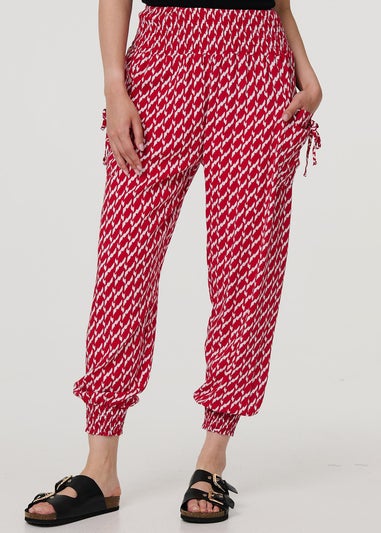 Izabel London Red Printed Tapered Harem Trousers