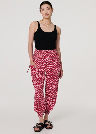 Izabel London Red Printed Tapered Harem Trousers