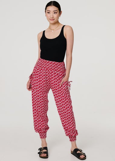 Izabel London Red Printed Tapered Harem Trousers