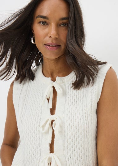 Cream Cable Tie Front Sleeveless Cardigan