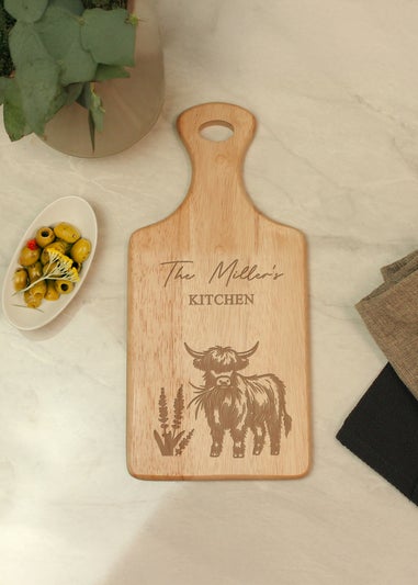 Personalised Memento Company Highland Cow Brown Paddle Chopping Board