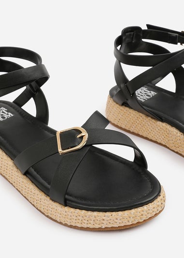 Where's That From Black PU Alora Cross-Over Buckle Strap Sandals