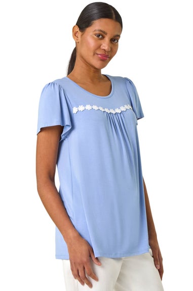 Roman Light Blue Daisy Trim Stretch Top