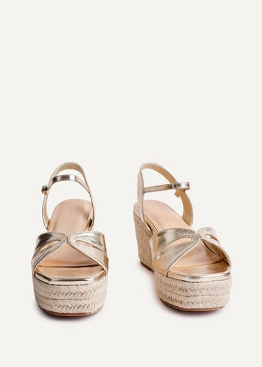 Linzi Sian Wide Fit Gold Faux Leather Linked Design Wedges