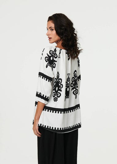 Izabel London White Ikat Print Tassel Tie Neck Blouse
