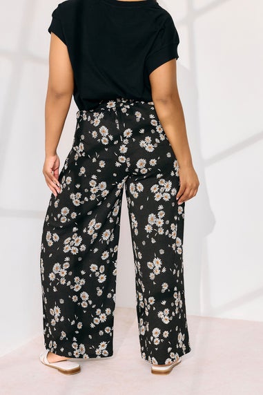Yours Curve Black Daisy Print Wide Leg Trousers