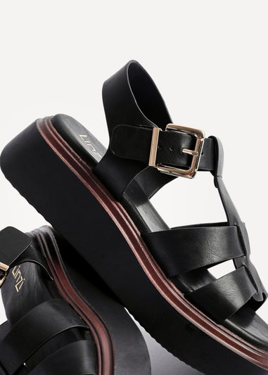 Linzi Retract Black Faux Leather Gladiator Style Flatform Sandals
