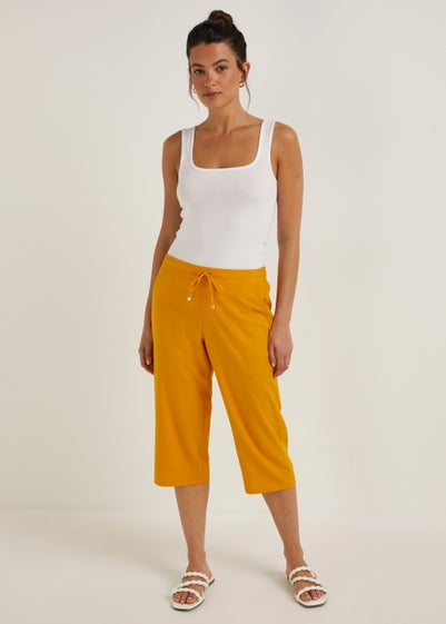 Orange Cropped Trousers