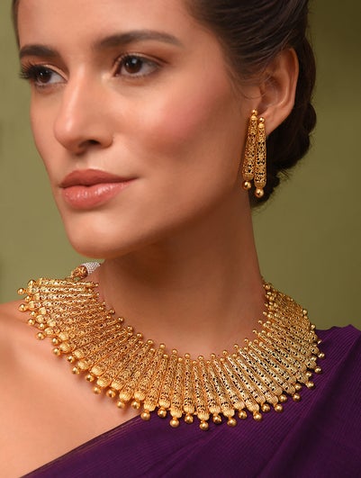 Women Gold Tone Temple Necklace Set