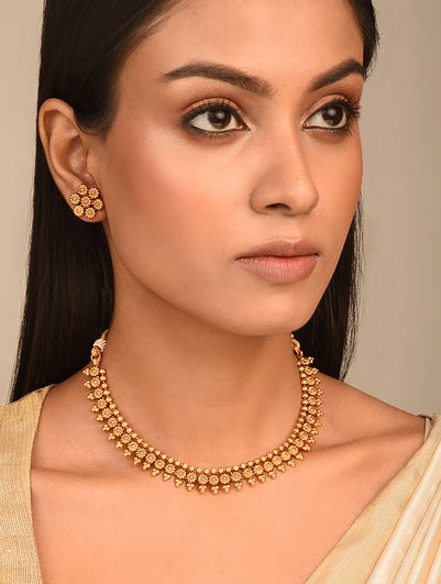 Gold Tone Temple Necklace with Earrings