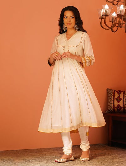 Women Ivory Cotton Silk V Neck Flared Kurta , Slip & Churidar - M