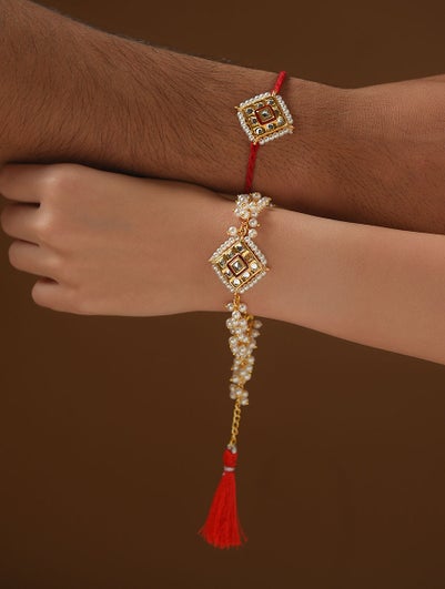 Women Red Gold Tone Kundan Handcrafted Rakhi With Lumba (Set Of 2)