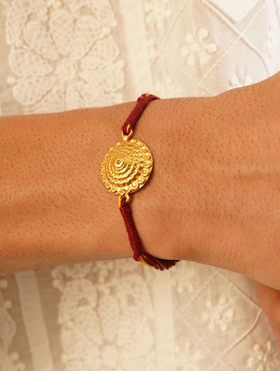 Women Gold Tone Silver Rakhi In A Gift Box