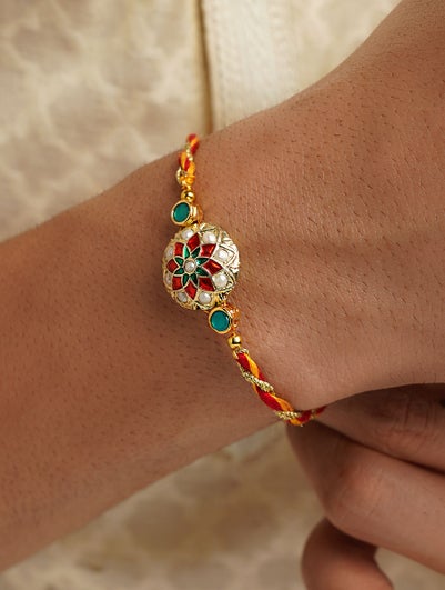 Women Gold Tone Handcrafted Enamel Rakhi In A Gift Box