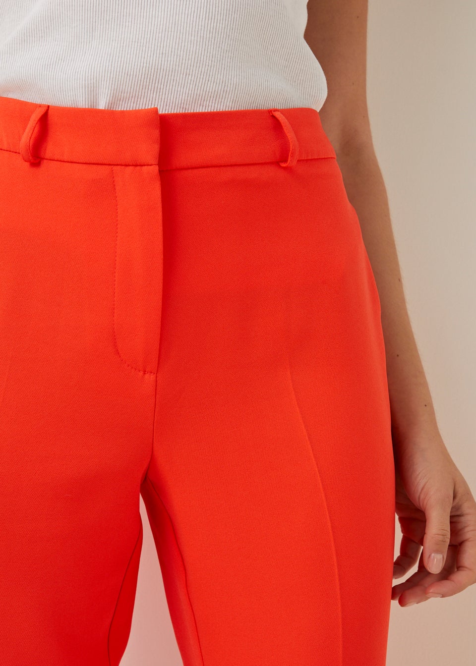 Orange tapered shop trousers