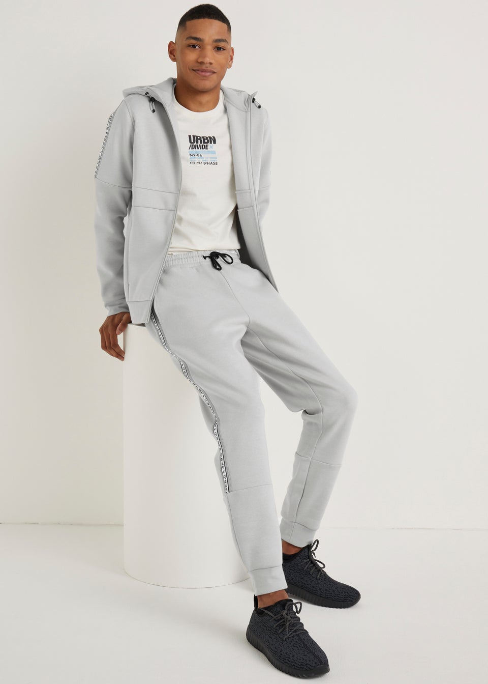 Nike grey best sale tape joggers