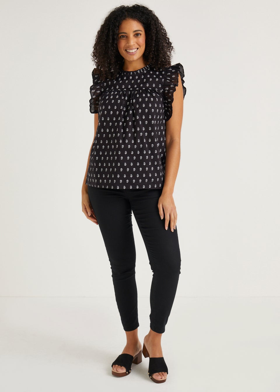 Black Print Frill Sleeveless Blouse