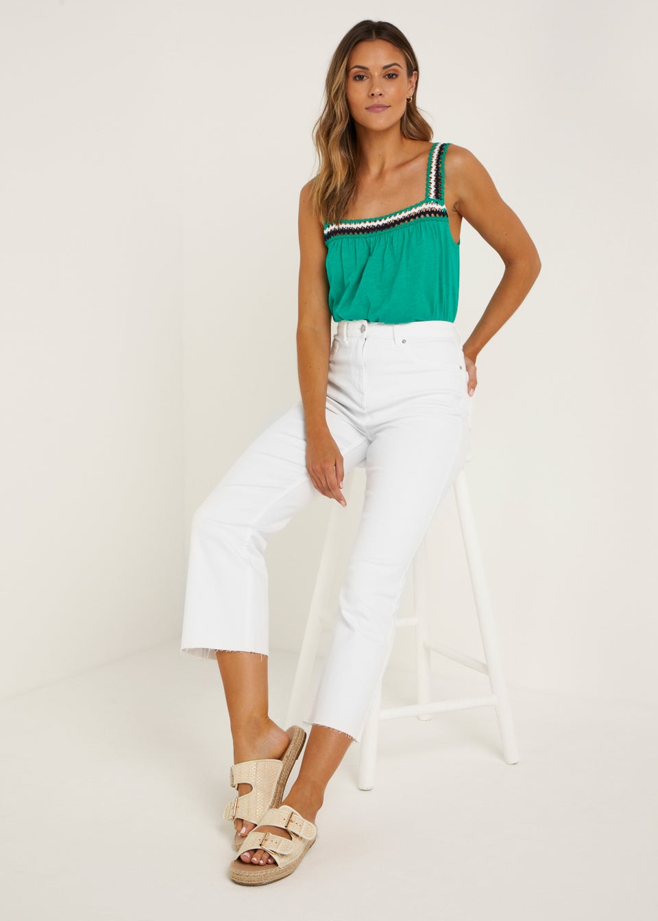 Cropped flare white jeans hotsell