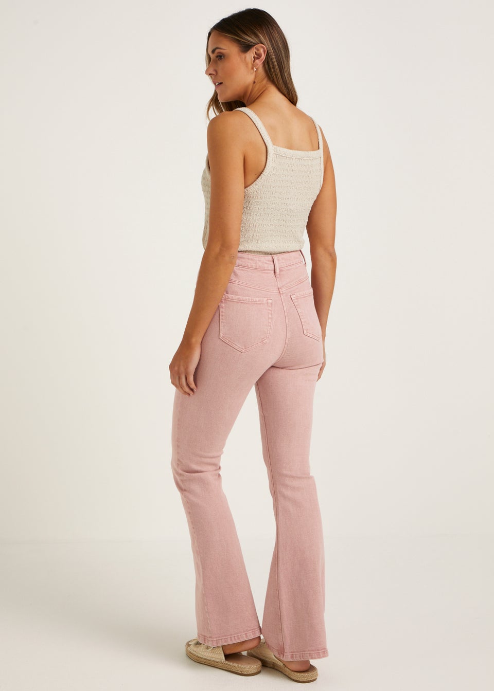 Light pink flare jeans shop