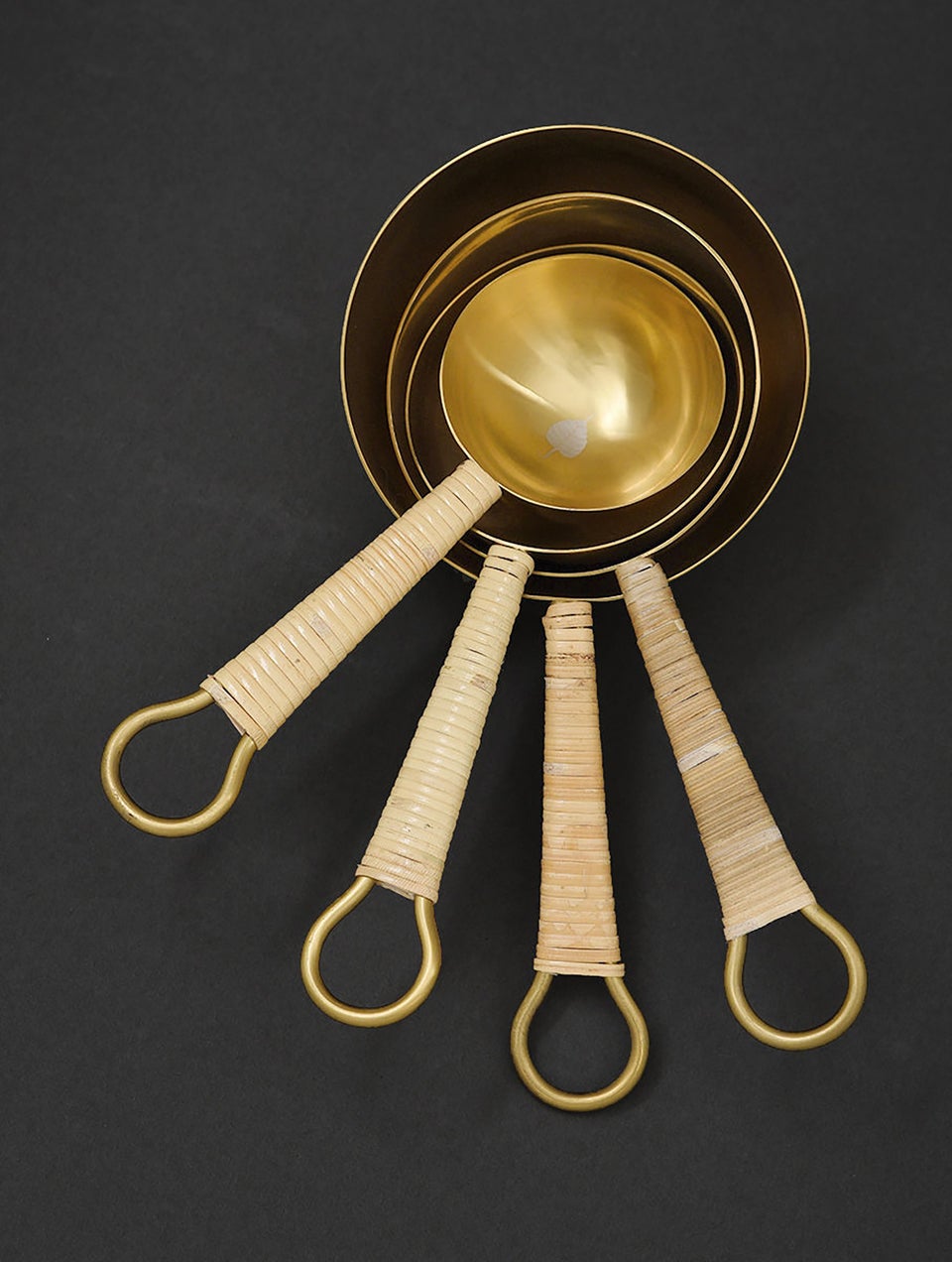 Steel and Rattan Gold Tone Measuring Cups
