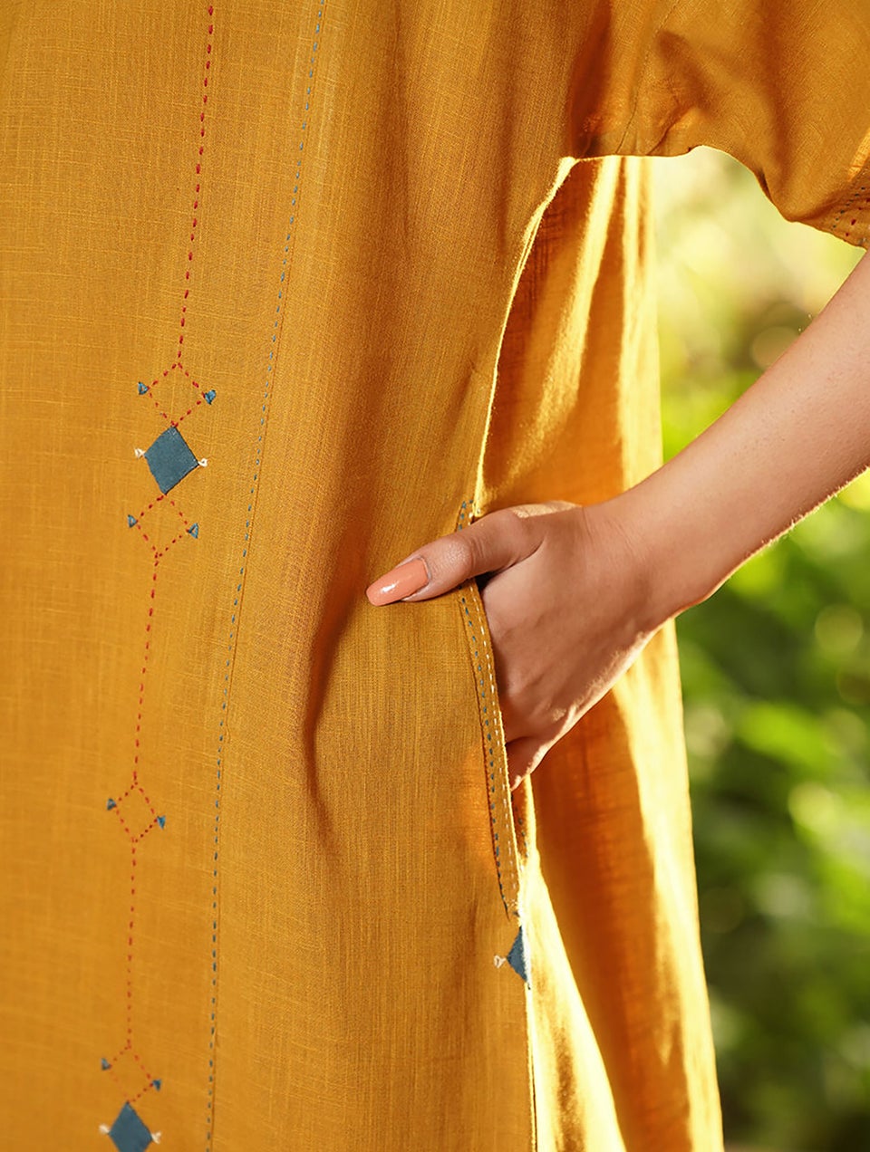 Women Mustard Hand Applique Cotton Kurta With Pockets - S-M