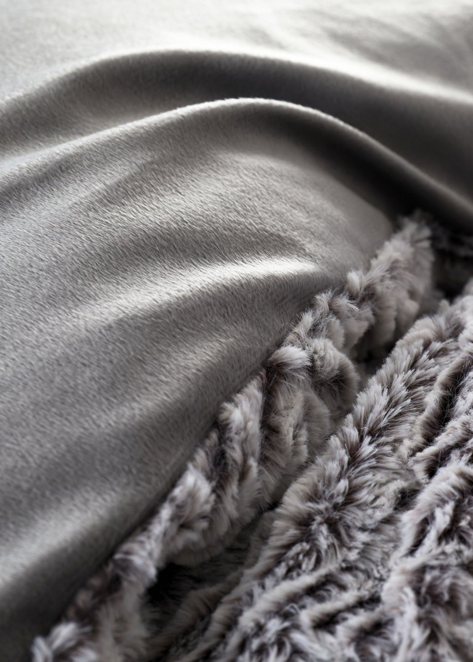 Wolf faux fur throw by catherine lansfield hot sale